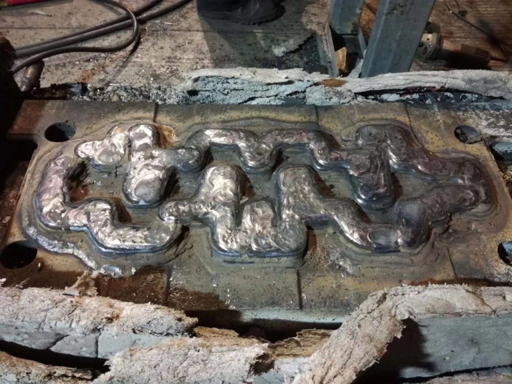 repaired forging die cavity